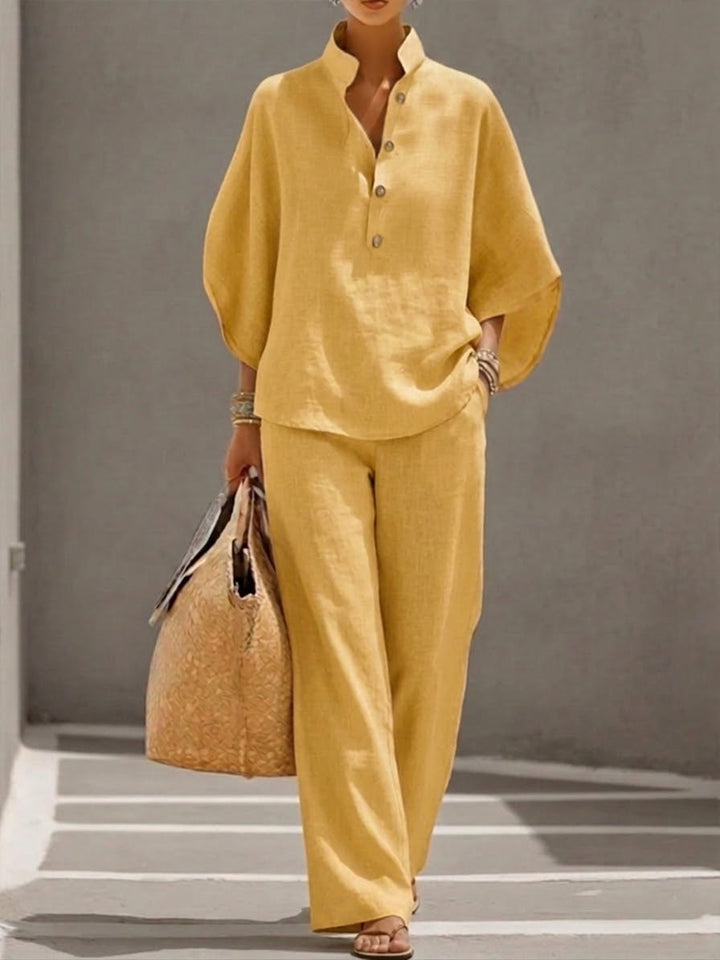 Woman styling the Nadia yellow wide-leg pants separately with a fitted white tee for a casual everyday look