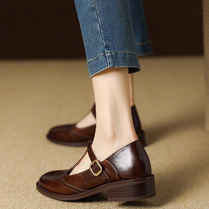 Nadine beige T-strap Mary Jane shoes, rear view highlighting structured block heel