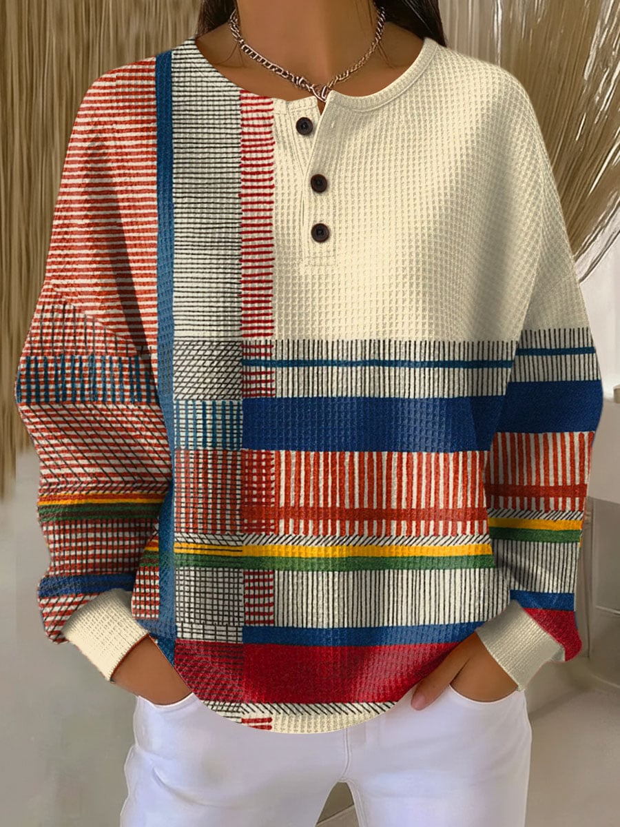 Woman wearing the Natalia multicolor lightweight blouse with a soft tailored silhouette, styled for an elegant everyday look
