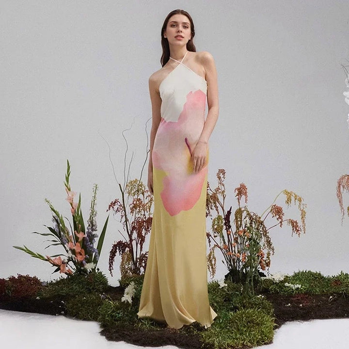 Front view of the Natasha white floral maxi dress showing the asymmetric one shoulder neckline