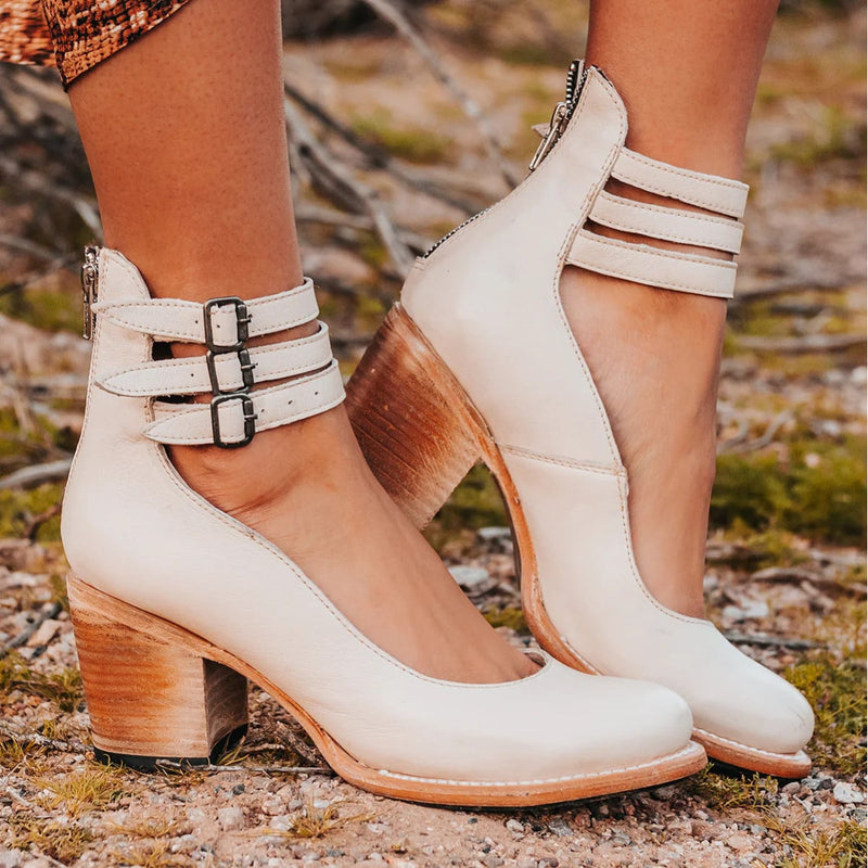 Side profile of Naturéva sandals showing the ergonomic footbed and sleek silhouette