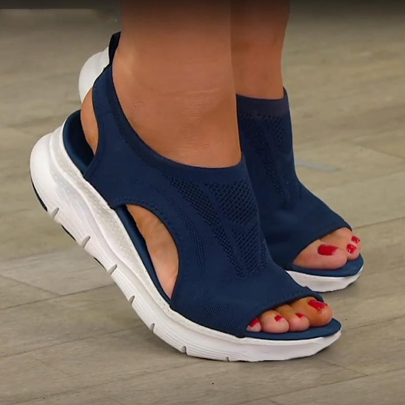 Nell women's sandals in blue shown from the front against a clean background