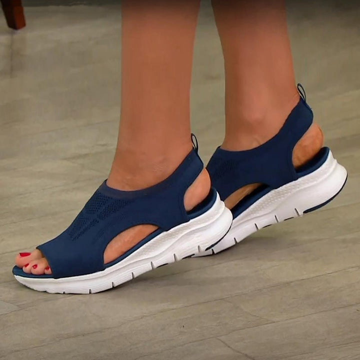 Nell sandals in pink displayed at an angle showing the cushioned insole