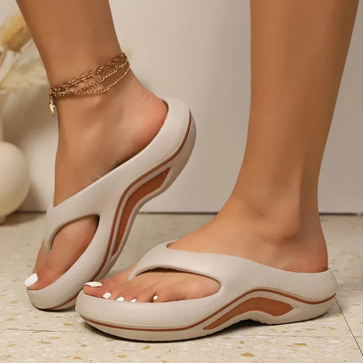 Close-up of Nerida orthopedic slide sandal cushioned insole and lightweight sole