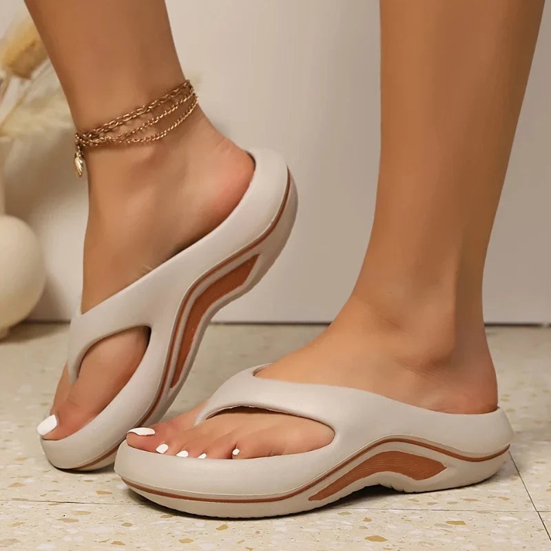 Close-up of Nerida orthopedic slide sandal cushioned insole and lightweight sole