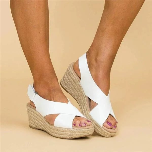 Neve women's sandal in black with sleek adjustable straps, side profile view