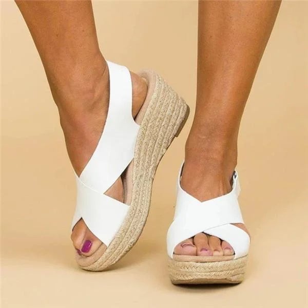 Neve orthopedic sandal in black showing cushioned sole and strap detail, top view