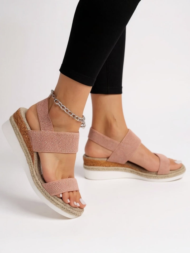 Neve women's platform sandals in brown with cushioned insole and minimalist strap design, side view