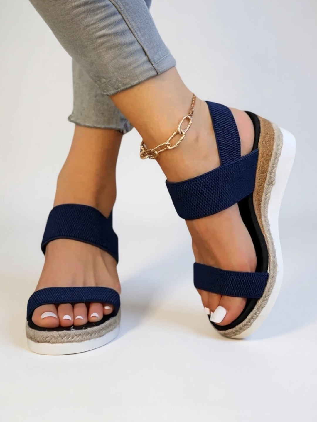Neve platform sandals in gray shown from above to highlight the minimalist strap layout