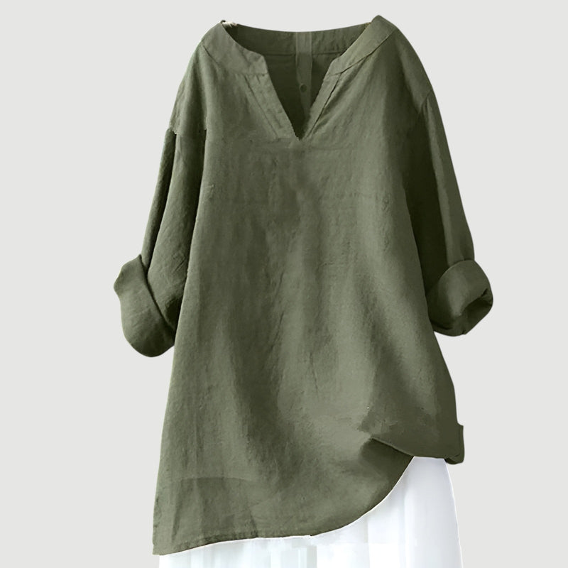 Close-up detail of the airy, breezy fabric and minimalist design of the flowy women's top