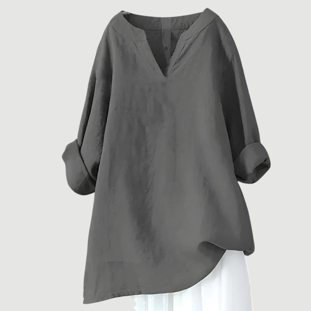Side view of the lightweight flowy top highlighting its easygoing cut and breezy drape