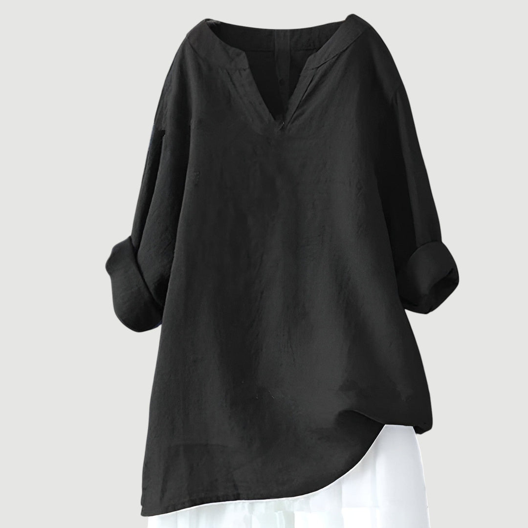 Flat lay or styled shot of the comfortable flowy top showing color and fabric detail