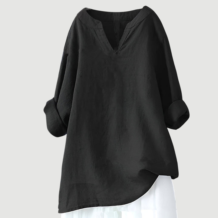 Flat lay or styled shot of the comfortable flowy top showing color and fabric detail