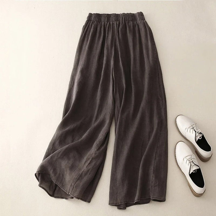 Side view of woman in airy straight-leg pants showing the flattering flowing silhouette