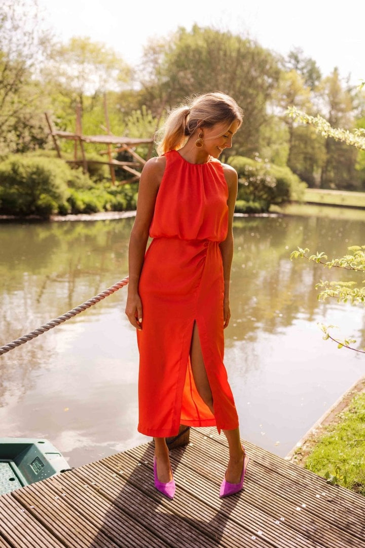 Side profile of the Nicole summer midi dress showing the soft drape and midi length