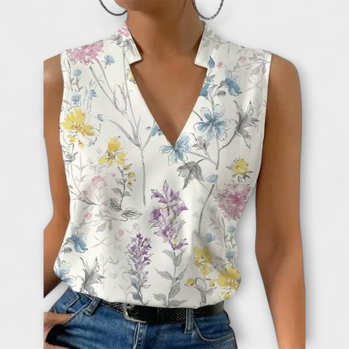 Nina wrap blouse in floral print, styled casually with denim