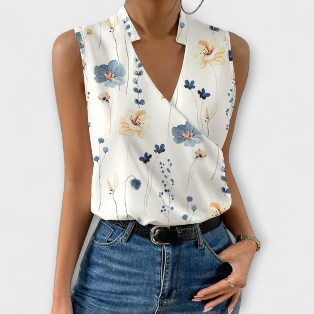 Flat lay of the Nina sleeveless wrap blouse showing available color options