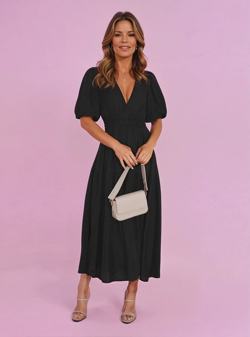 Noelle black V-neck puff sleeve smocked waist midi dress, front view, full length
