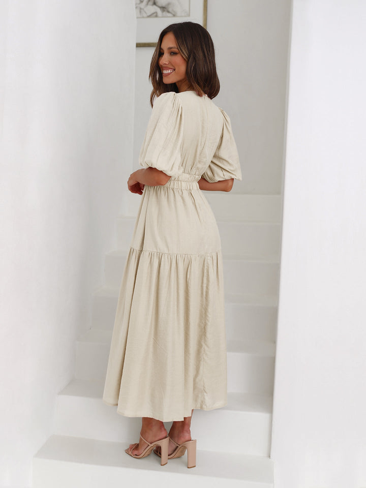 Noelle white midi dress back view showing smocked waist panel detail