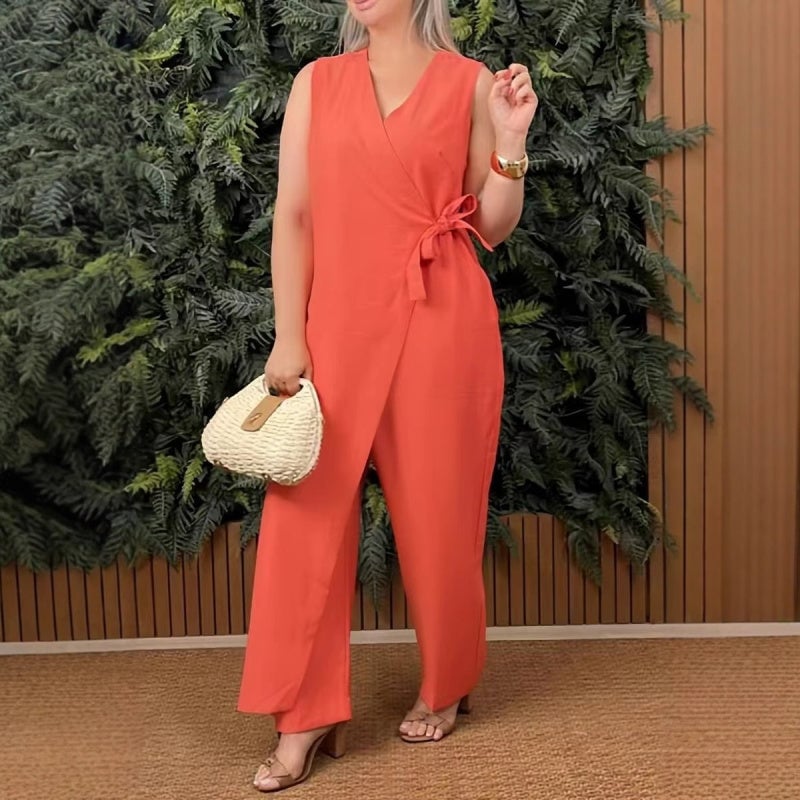 Women's sleeveless wrap V-neck tie-waist jumpsuit in black with straight-leg trousers and side-tie bow waist detail