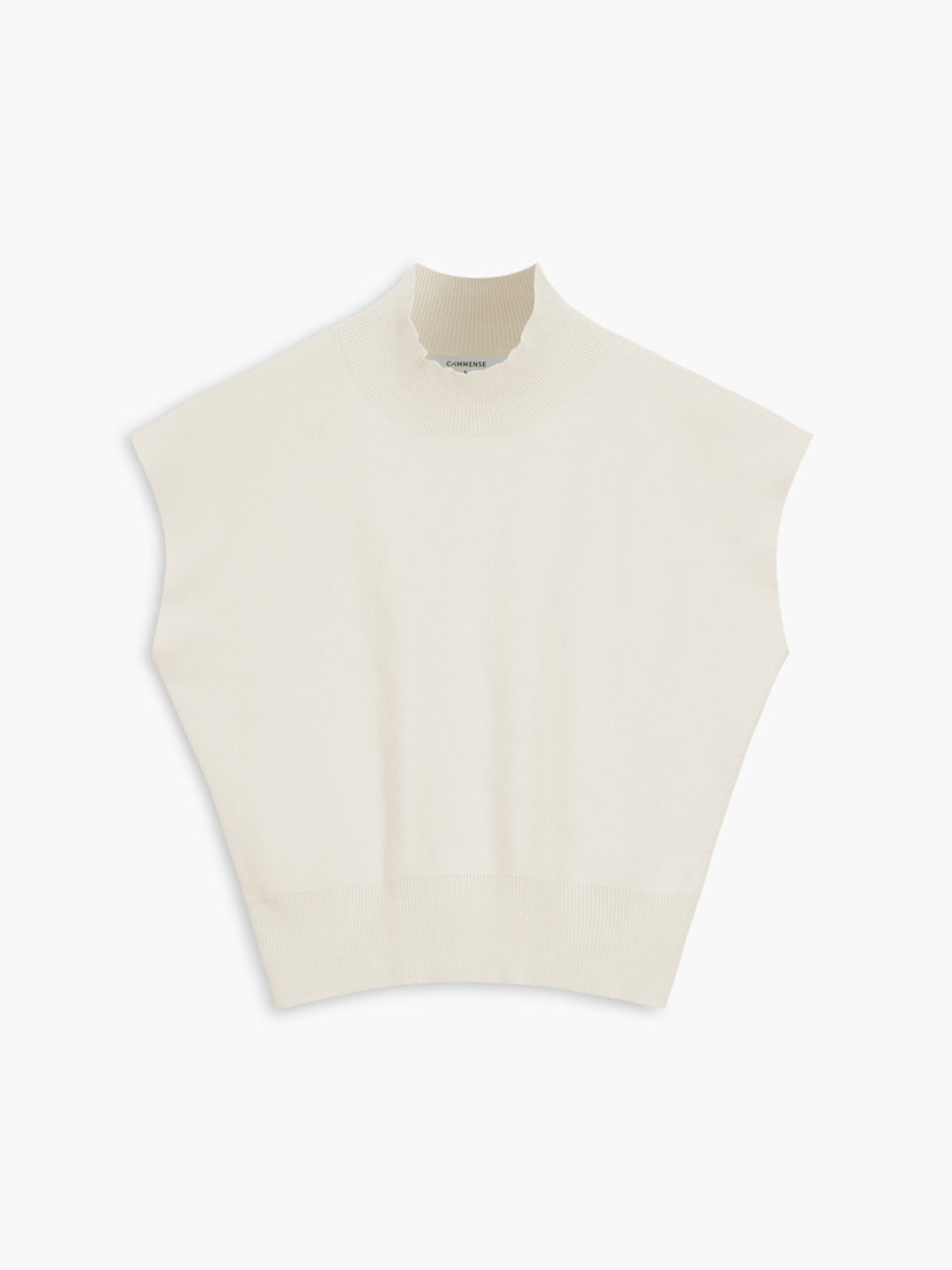 Close-up of padded shoulder detail on the Noira sleeveless knit top in black