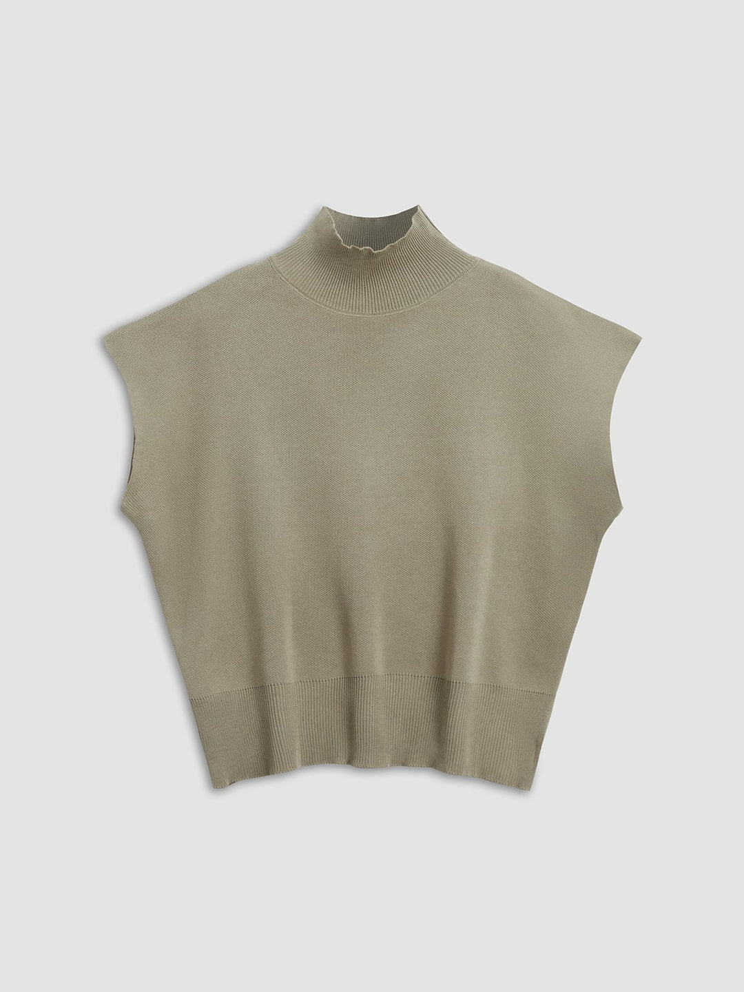 Back view of the Noira mock neck knit top in off-white