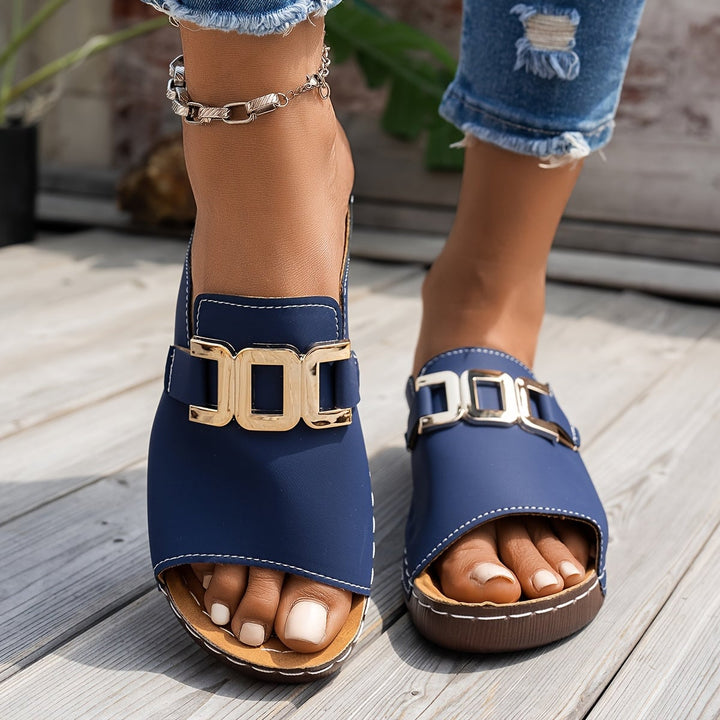 Nola women's sandal in black, front view on neutral background