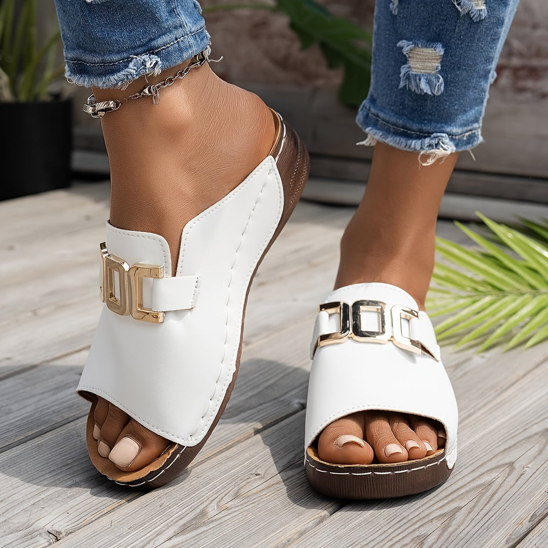 Nola women's sandal in black, top-down view highlighting strap detail