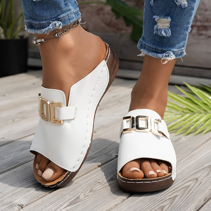 Nola women's sandal in black, top-down view highlighting strap detail