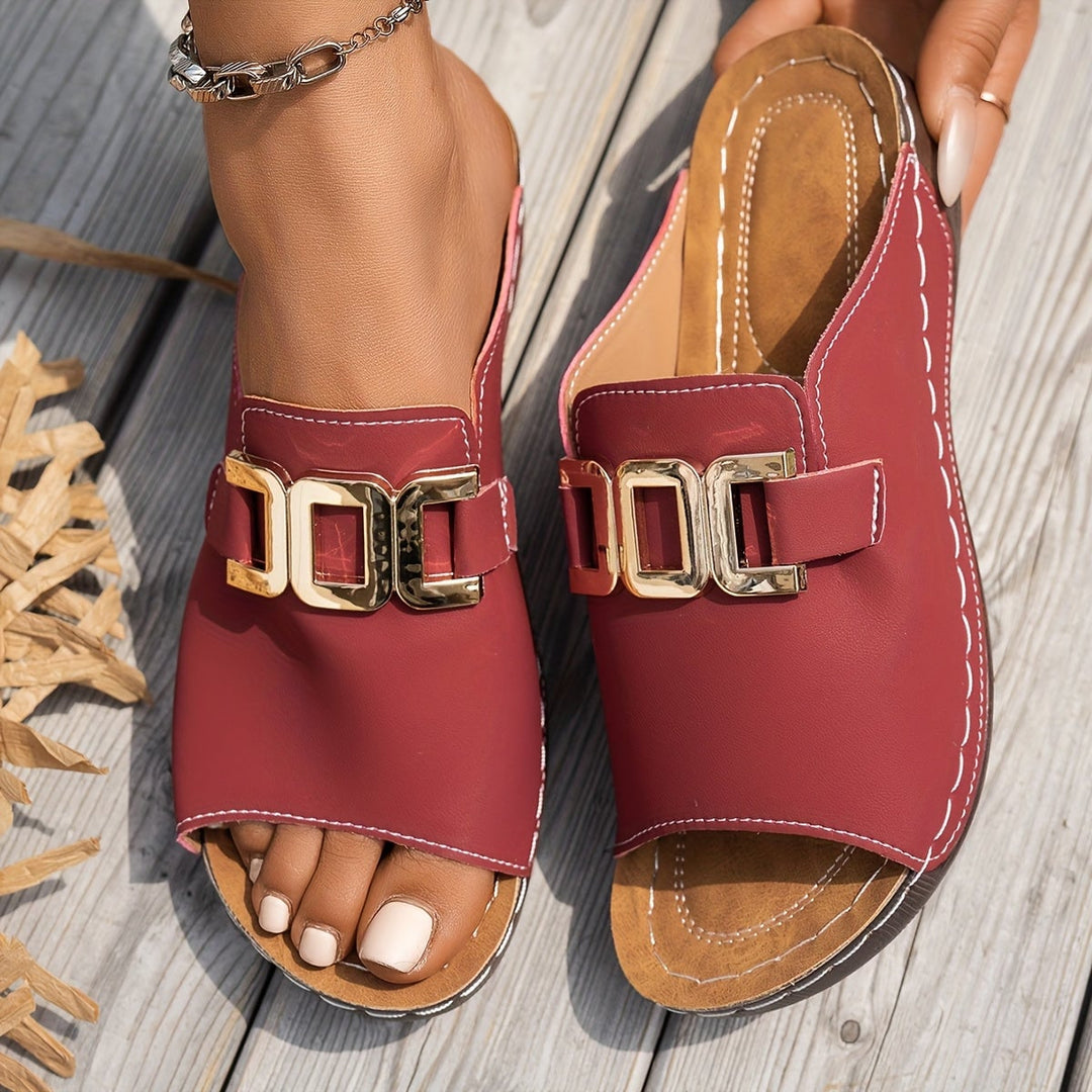 Nola women's sandal in blue, side profile showing modern silhouette