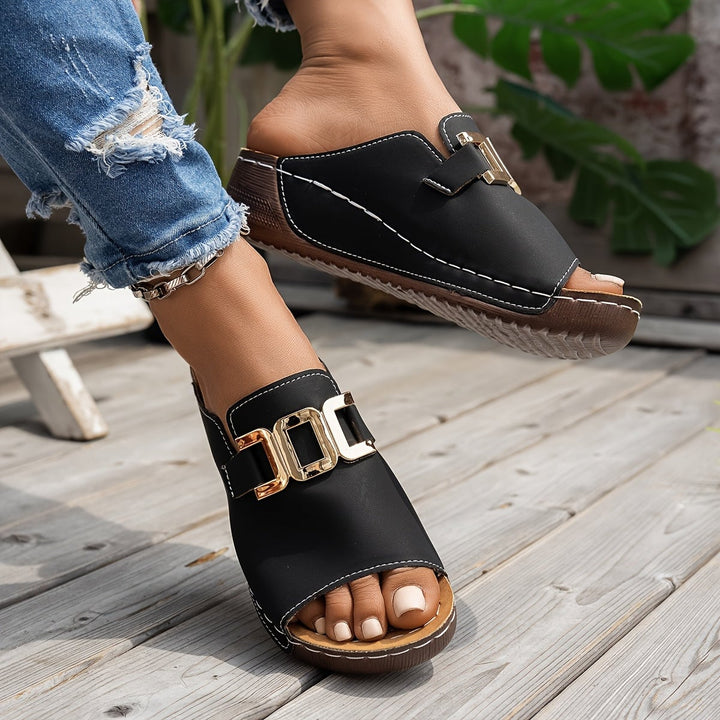 Nola women's sandal in blue, top-down view highlighting strap detail