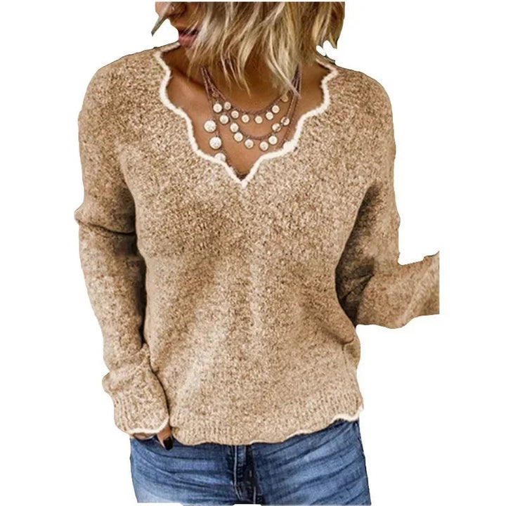 Close-up detail of the Nora elegant sweater showing its soft, lightweight knit fabric and refined finish