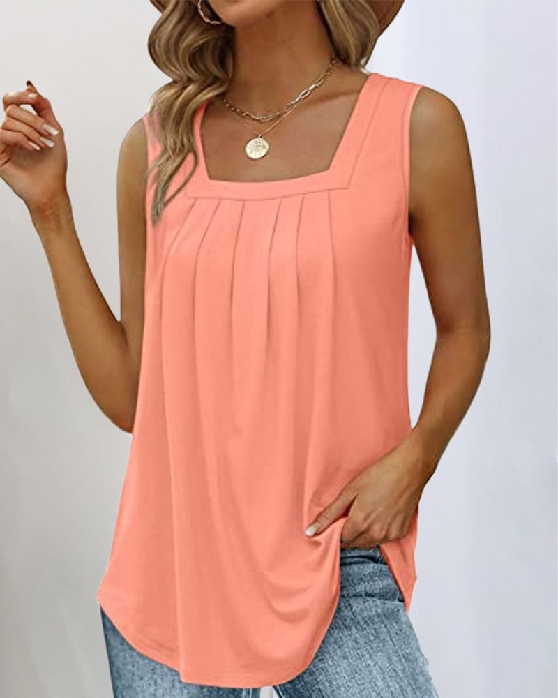 Model wearing a peach sleeveless square neckline top with a relaxed fit, front view