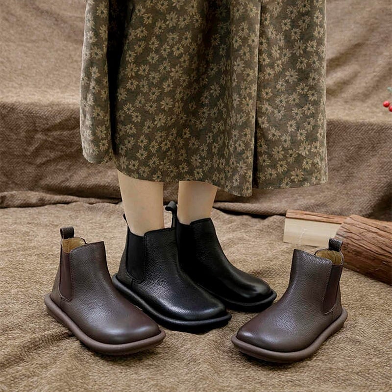 Close-up of the smooth toe and clean lines on the Nora slip-on boot in black