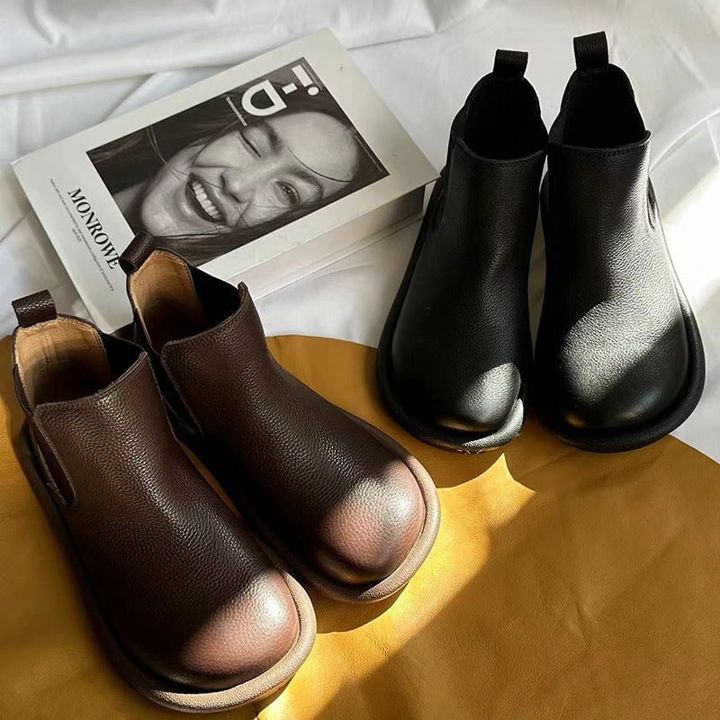 Nora slip-on boots in brown shown from a three-quarter angle