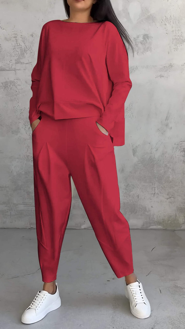 Woman in the Nora pink 2-piece lounge set standing in a relaxed pose, full-length front view