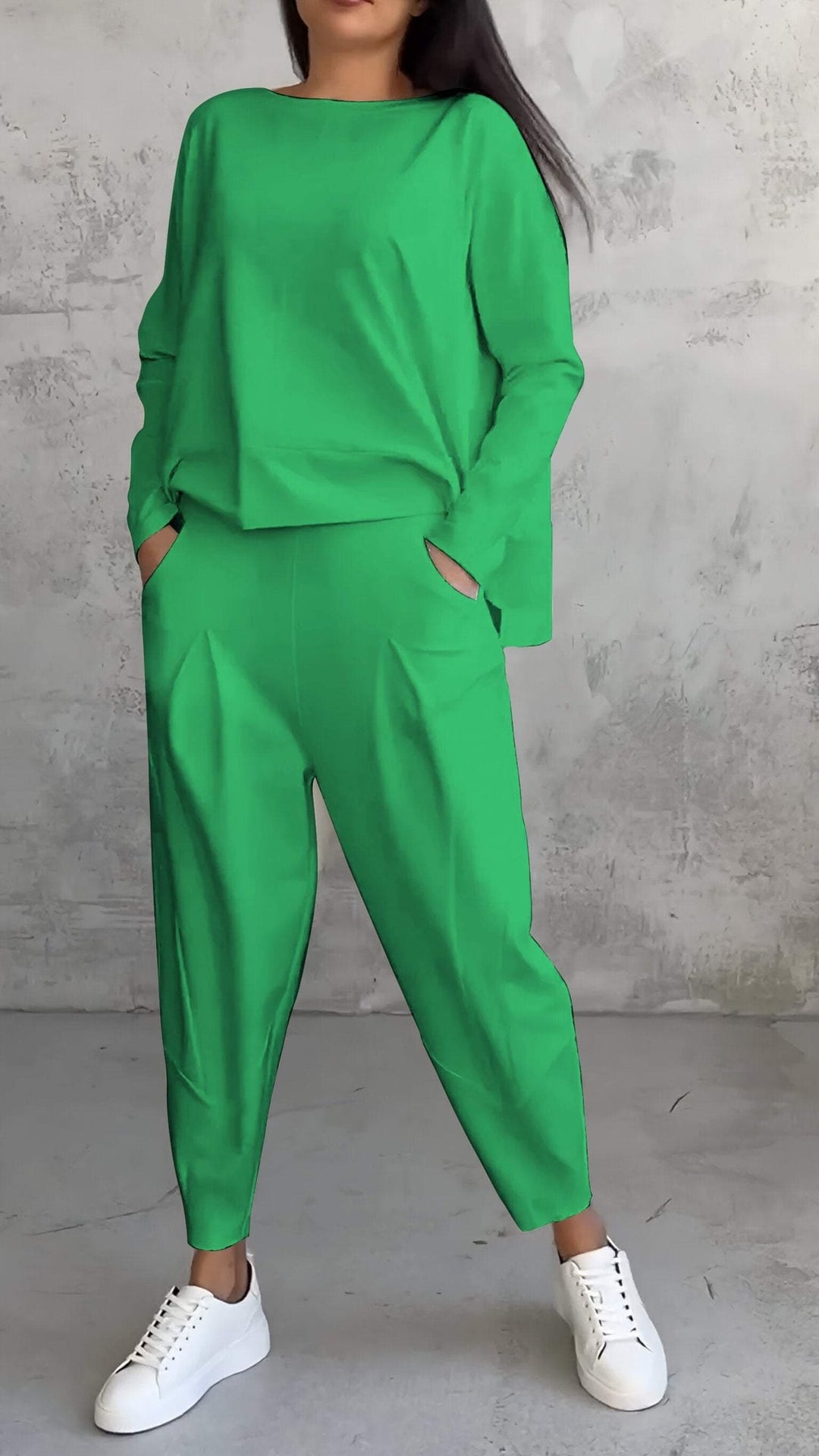 Front view of the Nora orange 2-piece lounge set showing coordinated monochrome styling