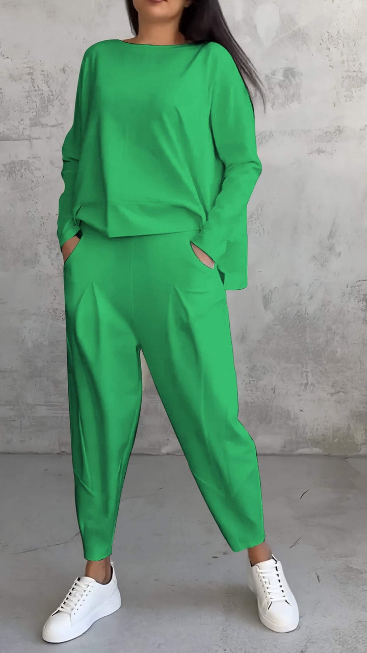 Front view of the Nora orange 2-piece lounge set showing coordinated monochrome styling