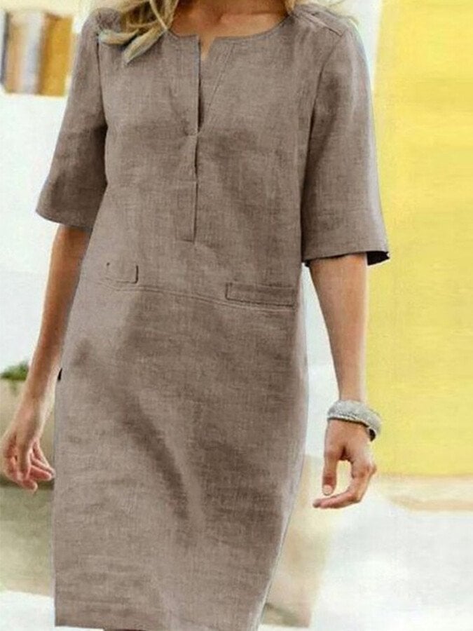 Front view of the Nora shift dress in Tan showing the relaxed straight silhouette and chambray-style woven texture
