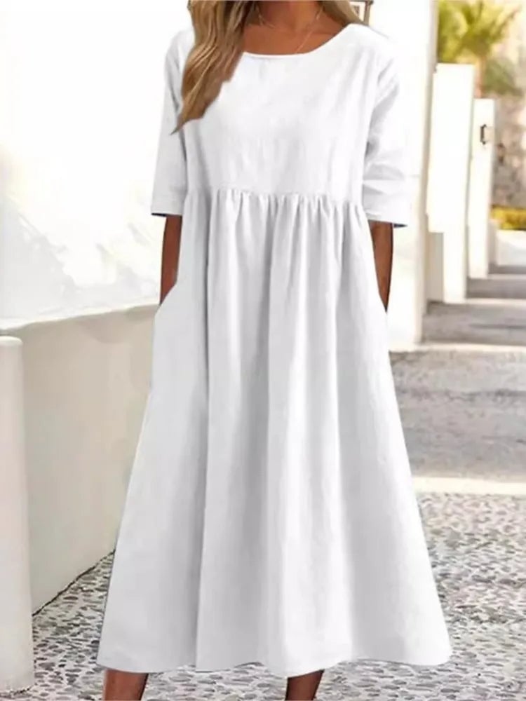 Close-up of the Norah spring dress showing lightweight fabric drape and flattering A-line silhouette
