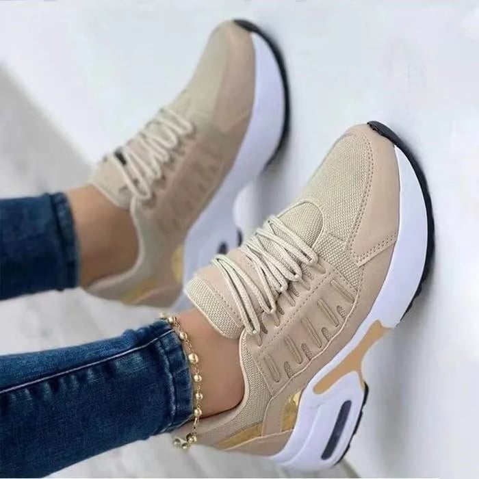 Nova chunky lace-up platform sneakers shown from the side, highlighting the thick white sole