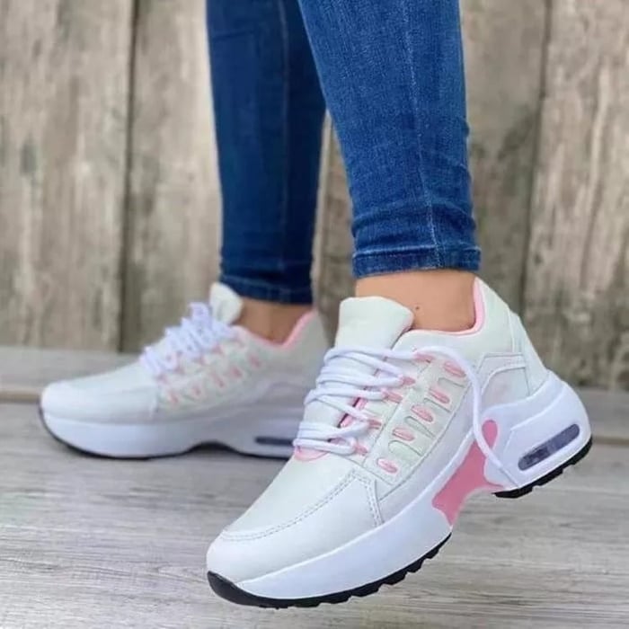 Pair of Nova chunky sneakers in gray, shown from above to display mesh upper and flat laces