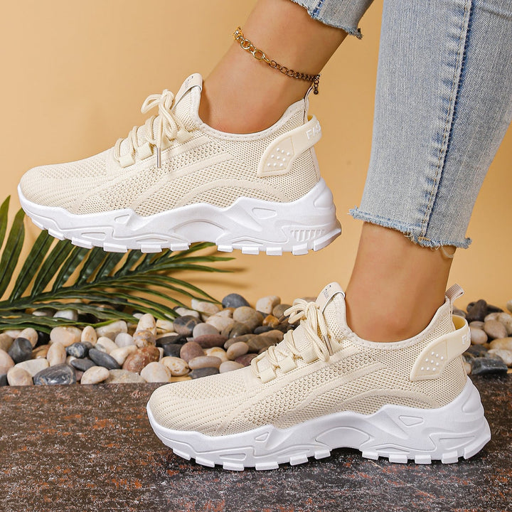 Nova women's chunky sole mesh lace-up sneaker in khaki, side view showing platform sole and open-knit upper