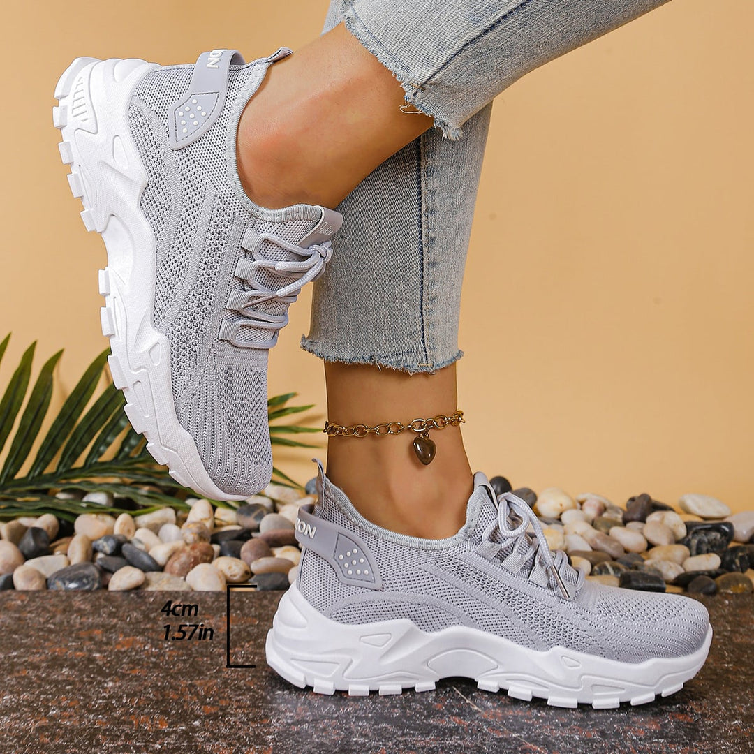 Nova platform walking sneaker in gray, showing full silhouette and lace-up fit