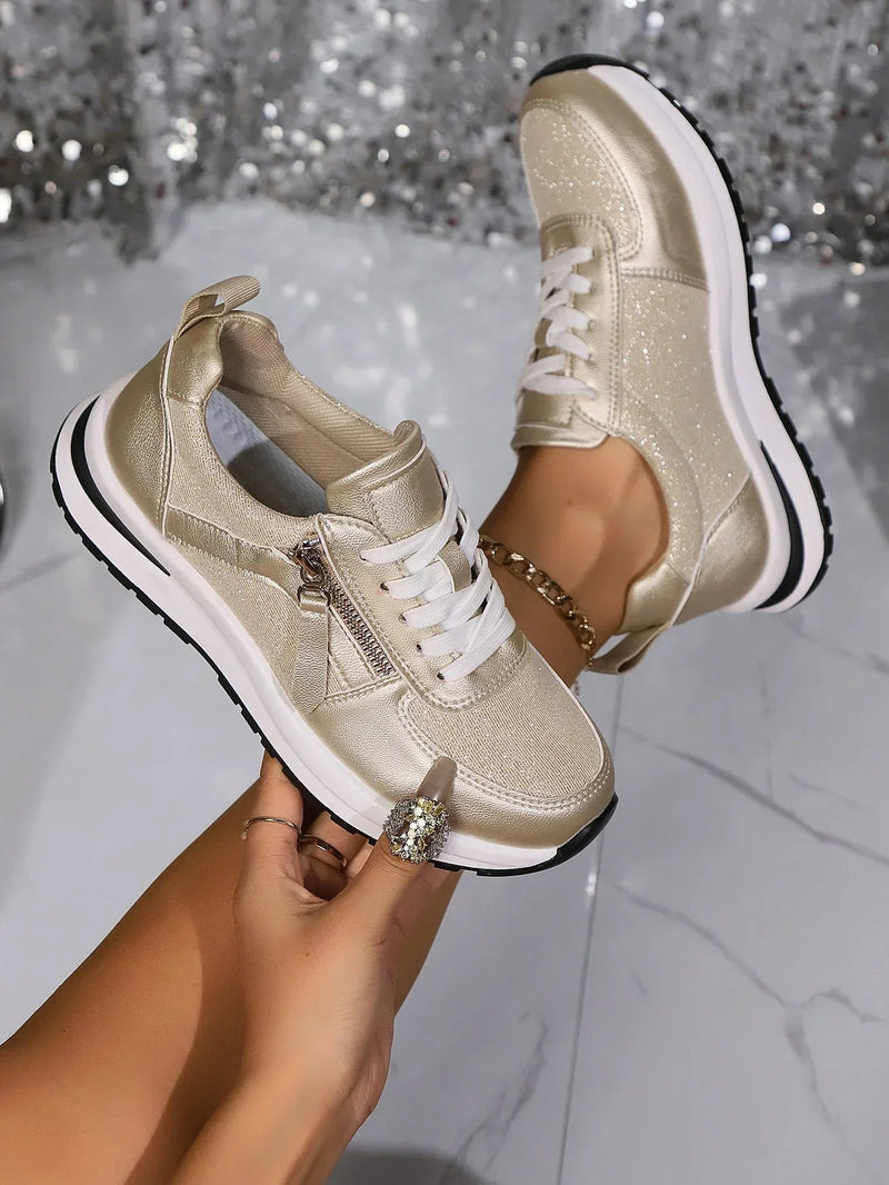 Nova silver platform sneaker side profile showing chunky white sole and zip detail