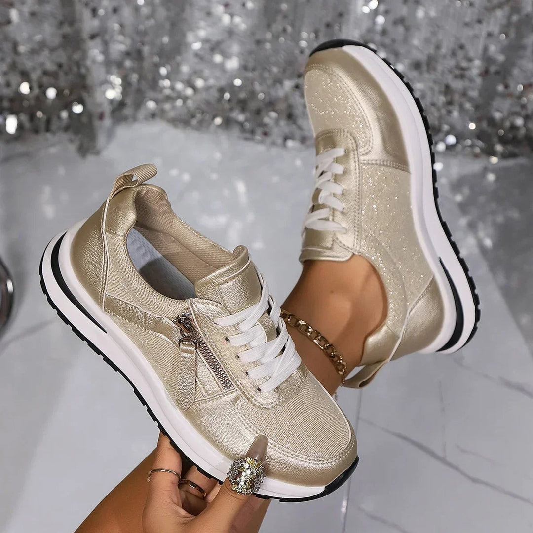 Nova silver platform sneakers worn on feet showing height of platform sole