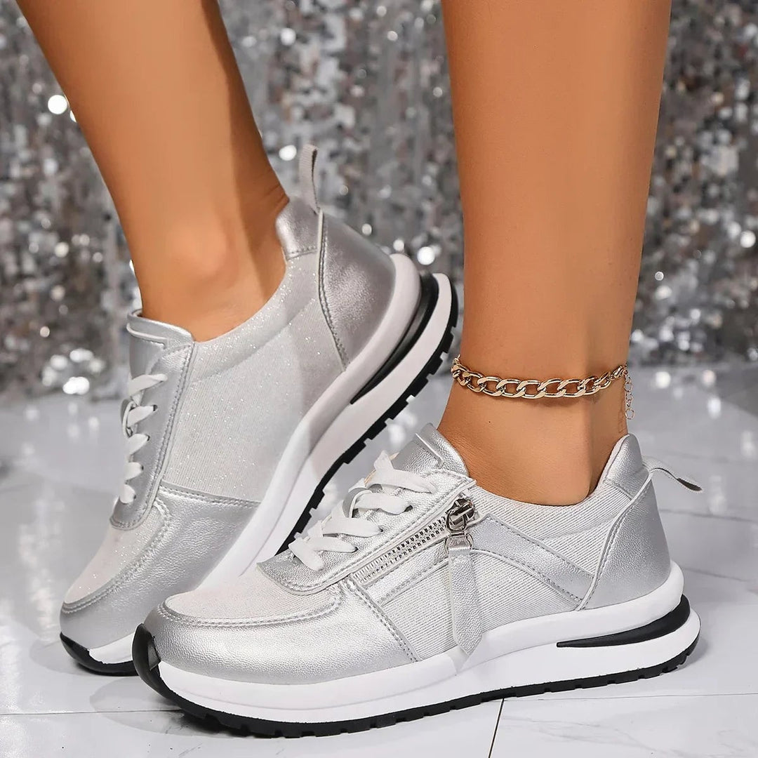 Nova gold platform sneakers worn on feet showing full silhouette
