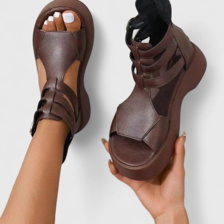 Nova women's brown platform sandals with open toe and adjustable ankle strap, side profile view