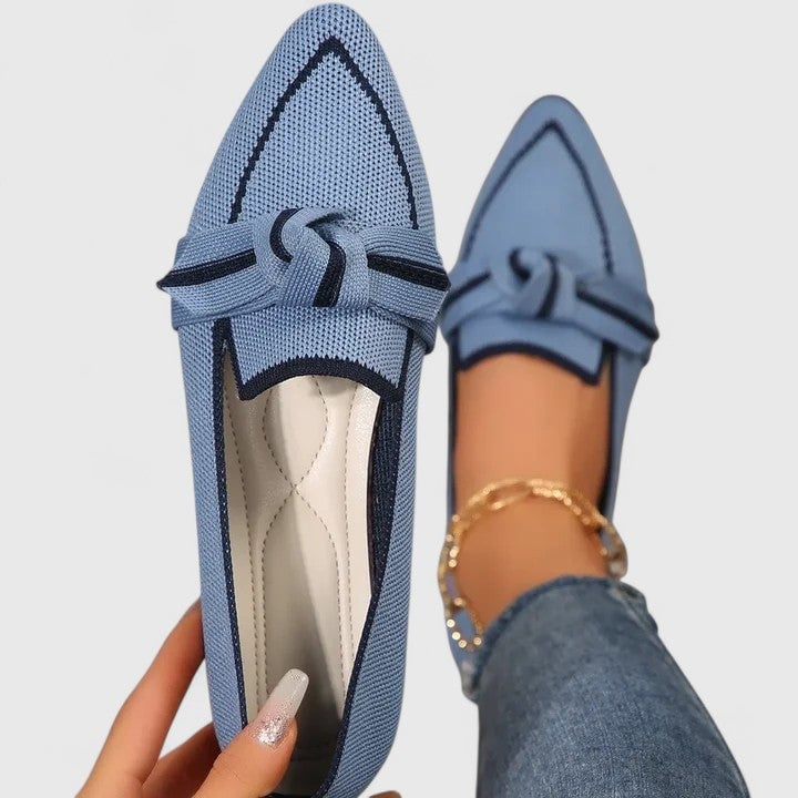 Women's Nova pointed-toe slip-on loafers with two-tone knot detail in white, front view