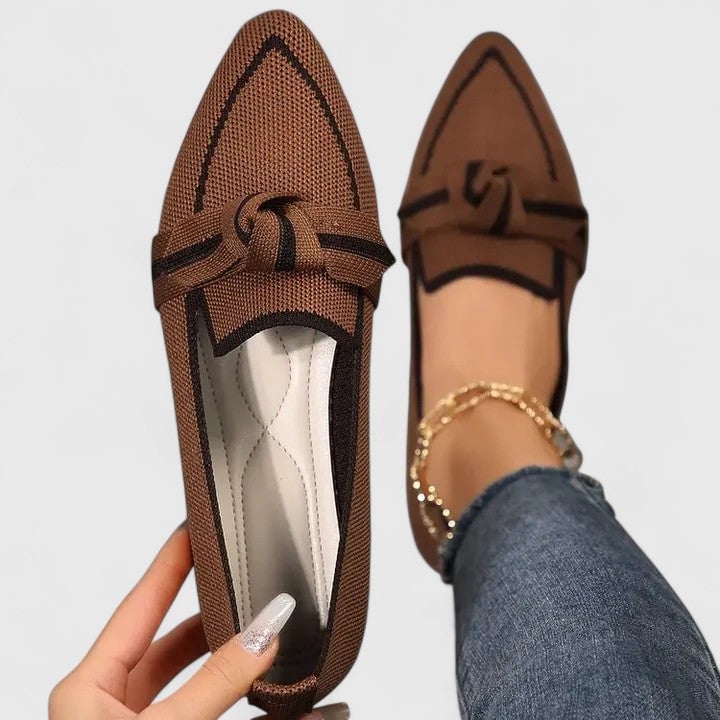 Close-up of structured two-tone knot vamp detail on Nova slip-on loafers